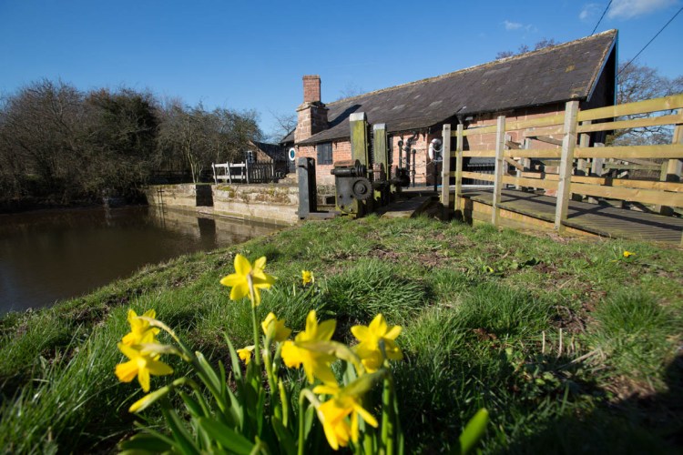 Picturesque spring view of the south façade of Stretton Watermill.