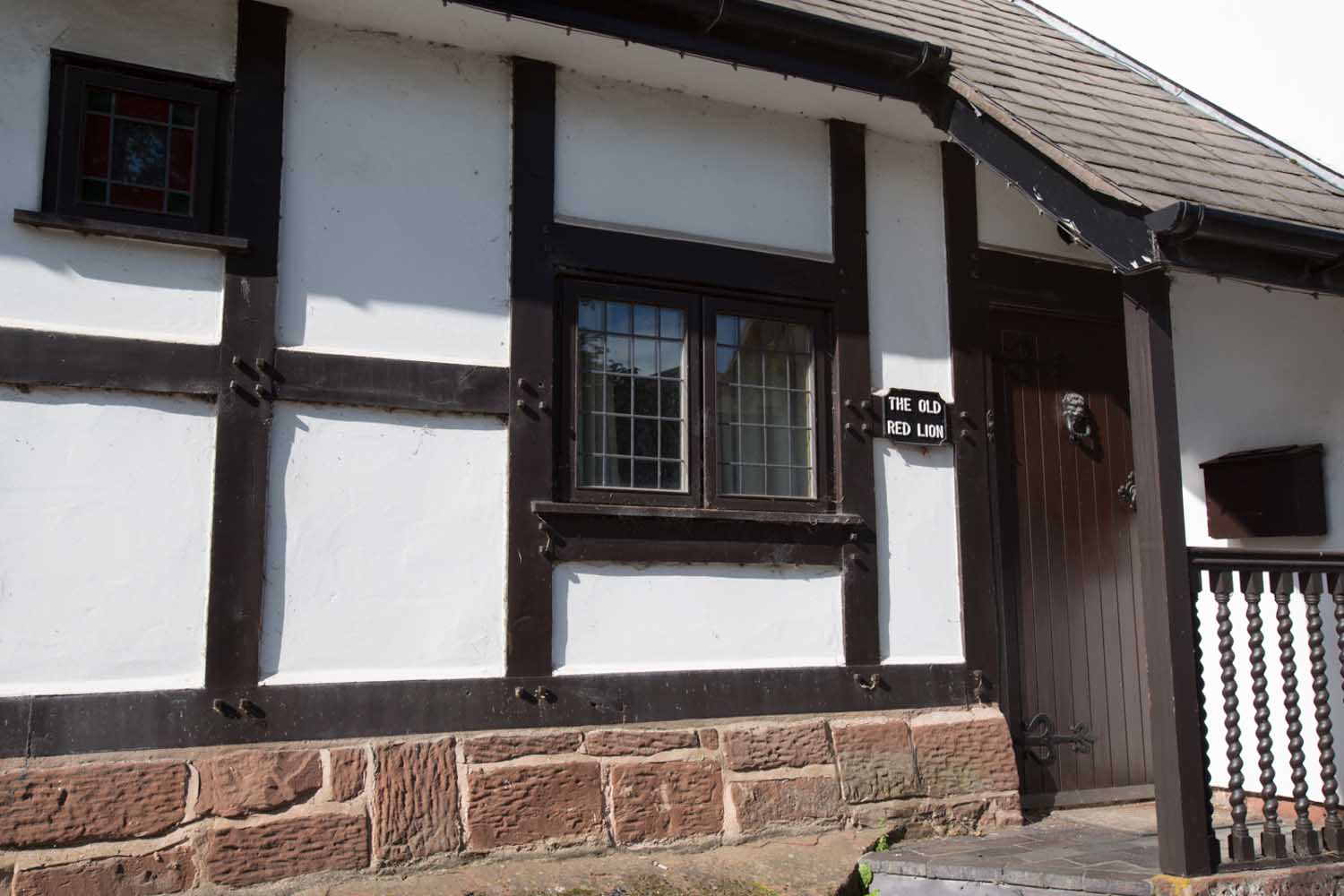 Village of Churton, Cheshire, England. The 17th century former Red Lion pub, now converted for residential purposes.