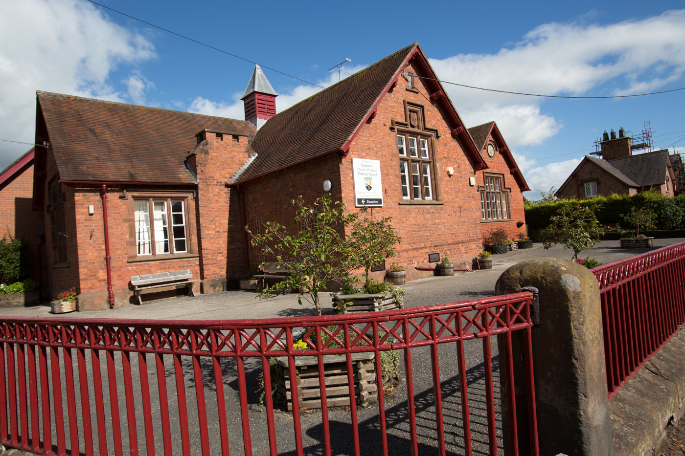 Village of Saighton, Cheshire, England. Picturesque view of Saighton’s Church of England Primary School. The majority of the properties in the village belong to the Duke of Westminster Estate.
